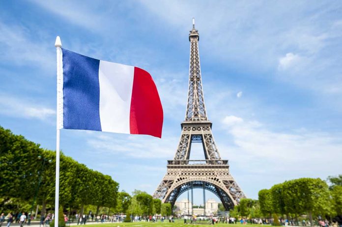 French,Flag,Flying,In,Bright,Blue,Spring,Sky,In,Front