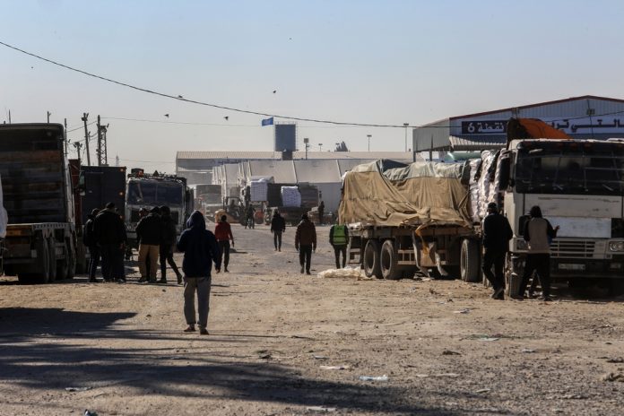 Trucks,Loaded,With,International,Aid,Enter,Gaza,Through,Kerem,Shalom