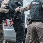 suspect being arrested