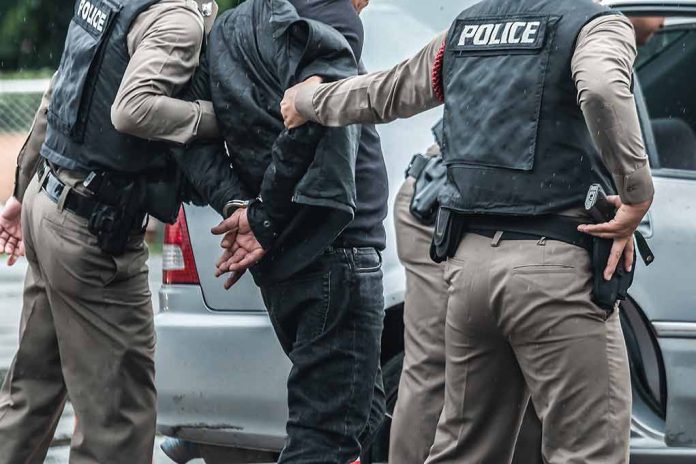 1137889661 featured image suspect being arrested