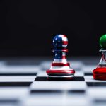 Chess pieces with USA and Iran flags on board.