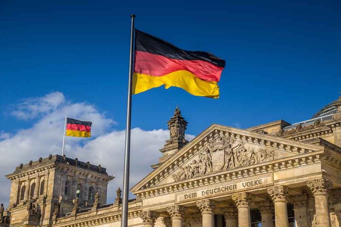 526234636 featured image German flags at the Reichstag building in Berlin.