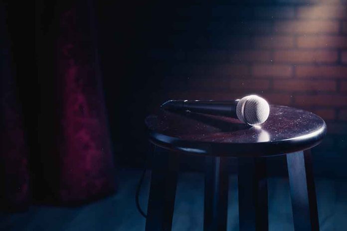 1007889328 featured image Microphone resting on a stool on stage.