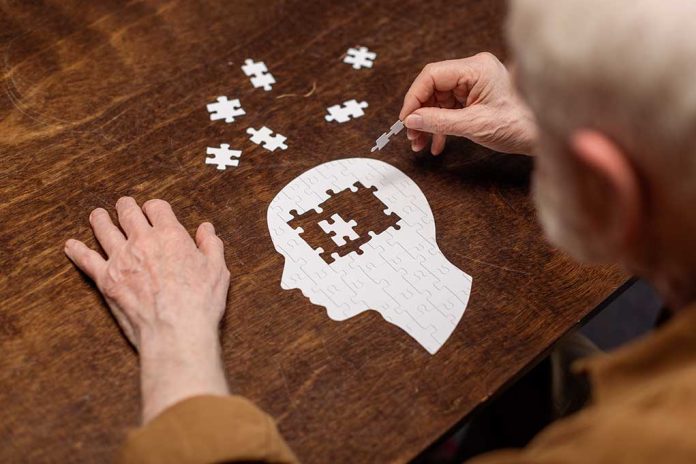1776503864 featured image Elderly person completing head-shaped jigsaw puzzle.