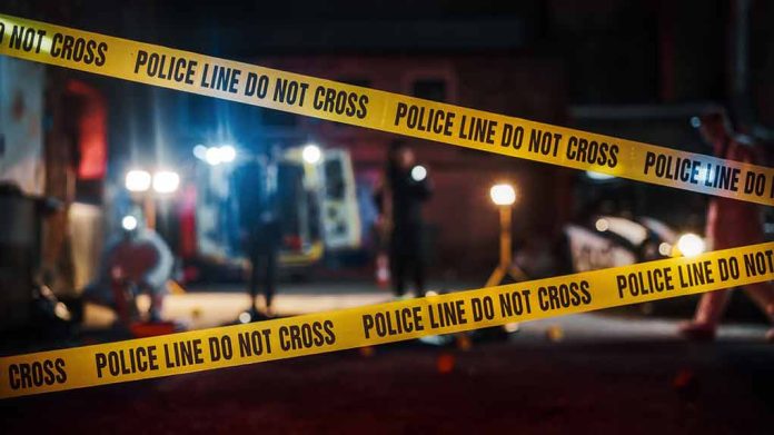 2230645955 featured image Yellow police tape in front of crime scene.