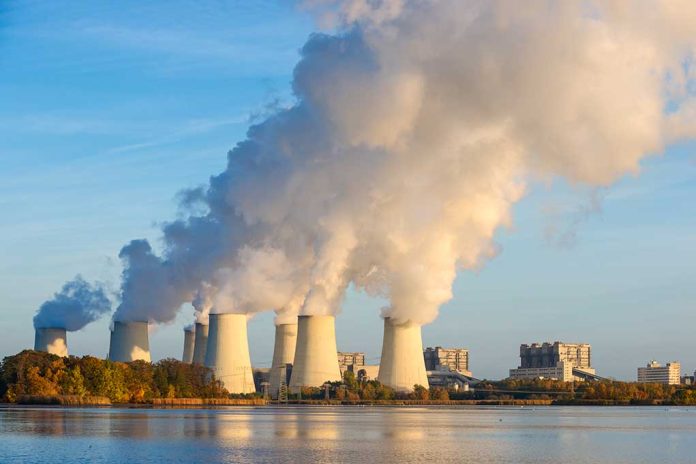 336115076 featured image Nuclear power plant cooling towers emitting steam.