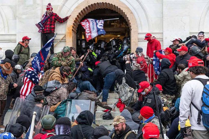 1889190778 featured image Crowd at building entrance, people wearing red hats.