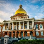 Building with golden dome and columns.