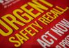 "Urgent safety recall sign in bold letters."