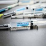 Syringes on table one labeled Fentanyl 50 mcg/ml