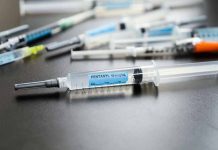 Syringes on table one labeled Fentanyl 50 mcg/ml