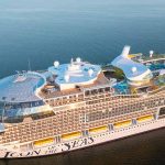 aerial shot of cruise ship on calm waters