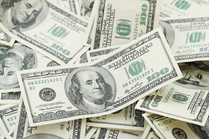 150954545 featured image Pile of one hundred dollar bills