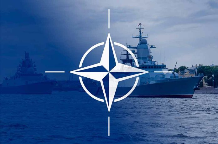 2113634360 featured image NATO emblem overlaying naval ships in the ocean