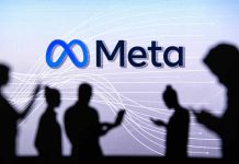 People silhouetted against Meta logo background