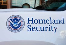 Homeland Security logo and text on vehicle door