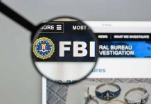 FBI website shown through magnifying glass