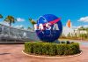 NASA logo sculpture with spaceship and palm trees