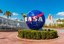 NASA logo sculpture with spaceship and palm trees