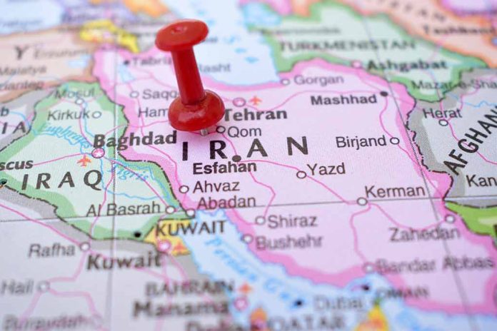 2237379503 featured image Red pushpin marking Iran on a map