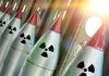 Line of nuclear missiles with radiation hazard signs