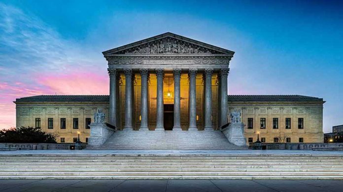 1662354055 Supreme Court building with illuminated pillars and steps
