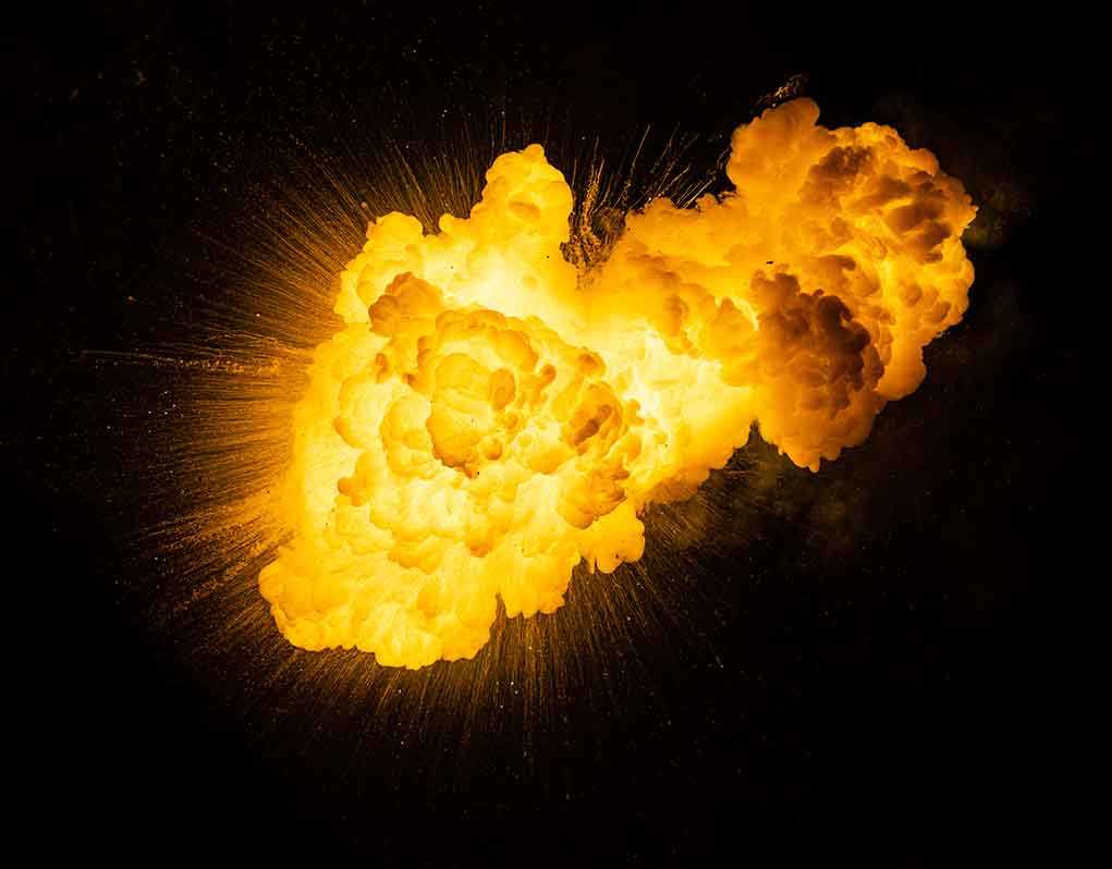 Bright fiery explosion against a dark background