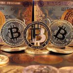 Bitcoins and Bitcoin themed banknotes in various designs