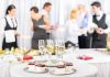 A table set with champagne glasses and desserts at a social event