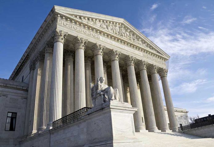 104498510 Supreme Court building with statue and columns.