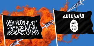 Two black flags with Arabic writing, flames background.