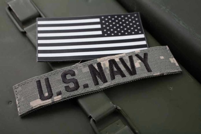 U.S. Navy patch with black-and-white American flag.