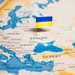 Sweden’s Makes Bold Billion-Dollar Aid Proposal to Ukraine Ukrainian flag on map of Europe and Asia.
