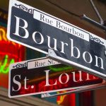 signs for Bourbon and St Louis streets in New Orleans.