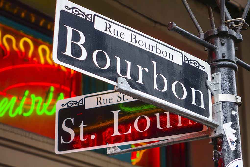 signs for Bourbon and St Louis streets in New Orleans.