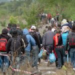 Tom Homan’s Controversial Border Security Changes Are Coming Group of people walking on a rural path