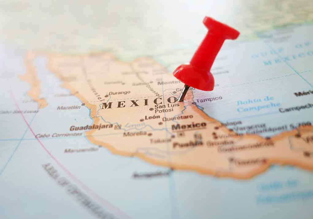 248690275 featured image image of a map of Mexico,with a red pushpin applied to the middle of the country