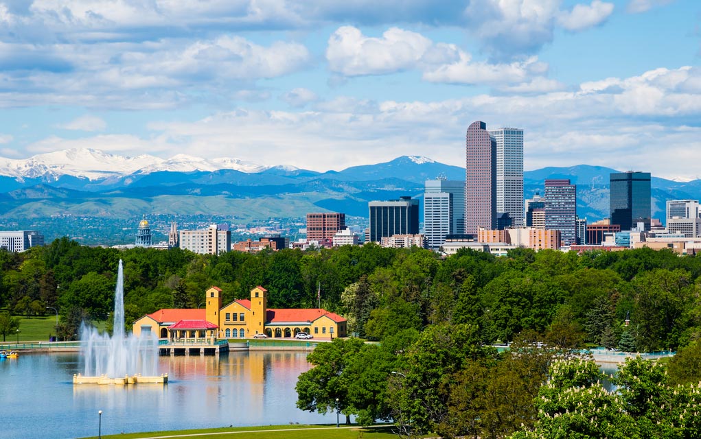 669025033 featured image City skyline with a lake and distant mountains