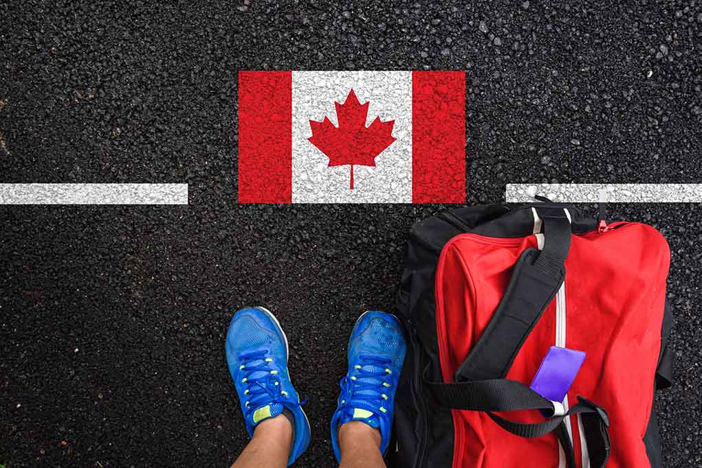 1770402584 featured image Shoes and bag beside painted Canadian flag.