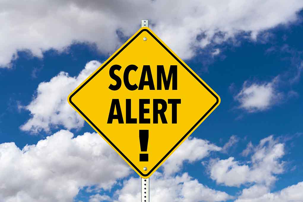 1882954588 featured image Yellow diamond sign saying scam alert warning