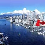 Election Interference Alert Threats Are Ramping Up In Canada City skyline with Canadian flag and boats visible