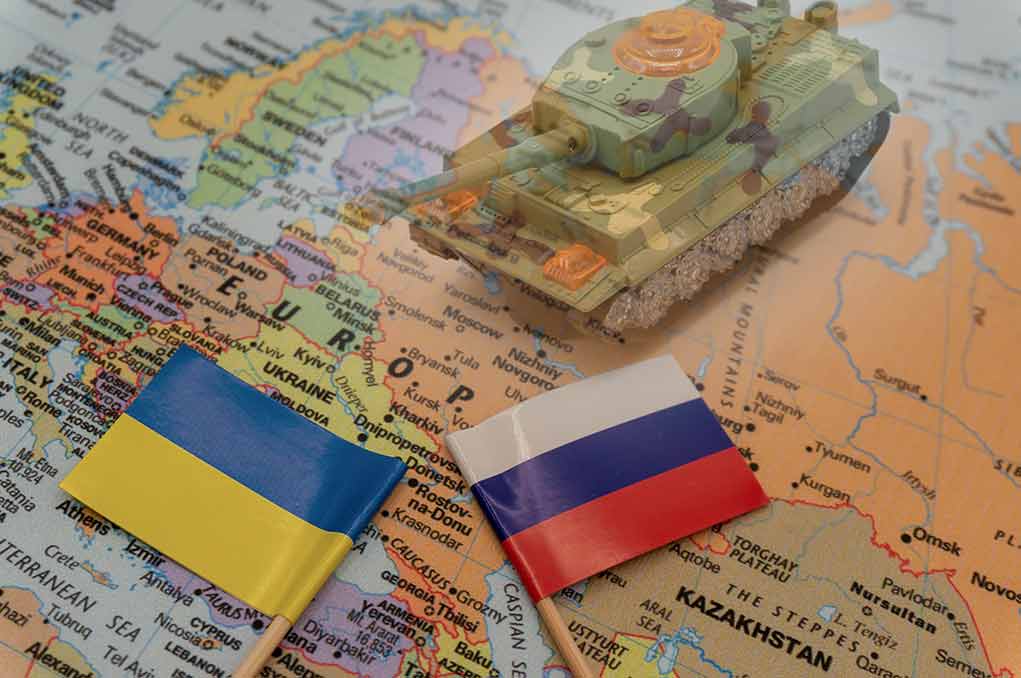 2114384846  featured image Toy tank on map with Ukraine and Russia flags