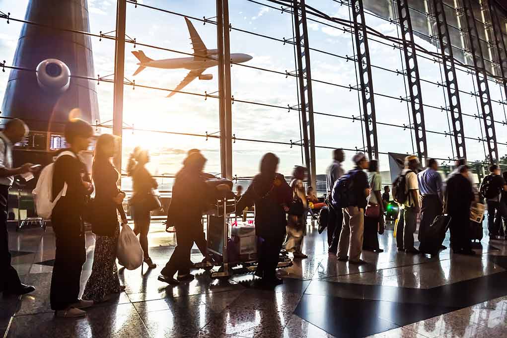 210042967 featured image People in line at busy airport terminal