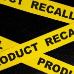 Deadly Bacteria Triggers Urgent Trader Joe’s Recall Yellow tape with product recall text on black background