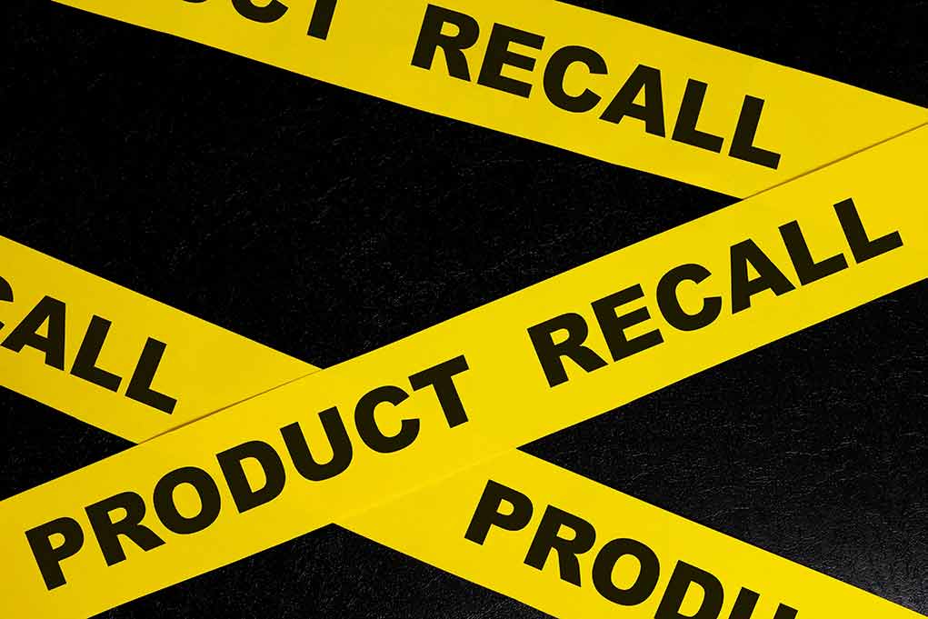 2263803439 featured image Yellow tape with product recall text on black background