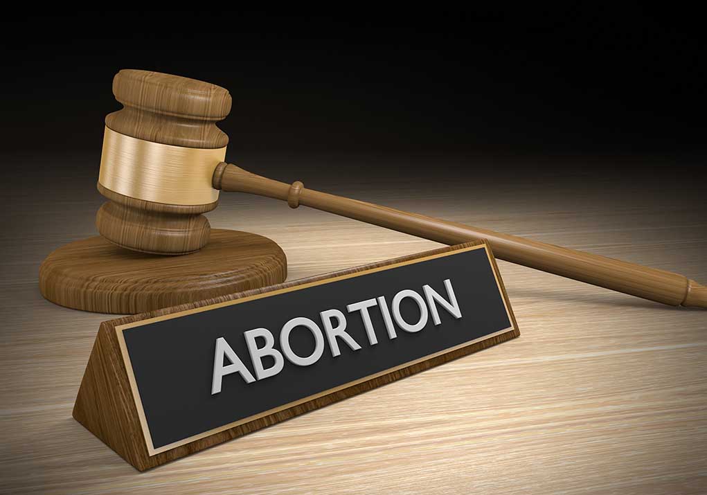 317138369 featured image Gavel and sign reading Abortion on a wooden surface
