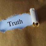 SHOCK 8.7% Birth Spike — Nobody Saw This Coming Ripped paper reveals word truth underneath brown surface