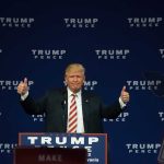 Trump SLAMS Chaos Claims — Blames Newsom Directly Man giving thumbs up at Trump Pence rally