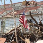 FEMA Overhaul IGNITES Massive State Scramble Damaged house with fallen tree and American flag