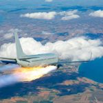 Plane Hijacker Nabbed— Raid Stuns Nation Passenger airplane with rocket engine flying over countryside